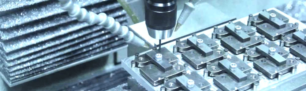 CNC machining operation using multiple precision fixtures to ensure batch accuracy and repeatability